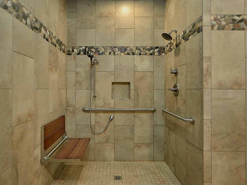 One of the large shower stalls at RIVEREDGE RV PARK & CABIN RENTALS