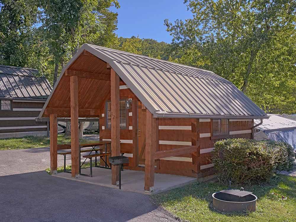 One of the rustic camping cabins at RIVEREDGE RV PARK & CABIN RENTALS