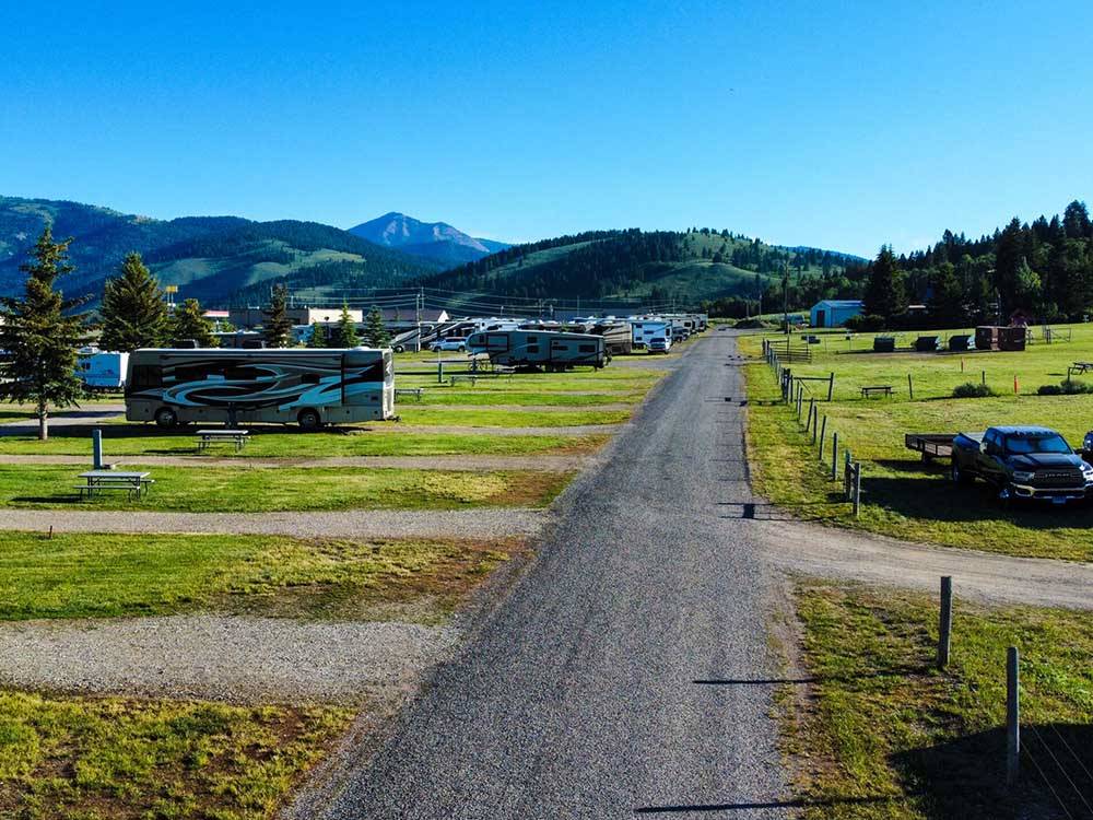 A gravel road leading to RV spots at VALLEY VIEW RV PARK