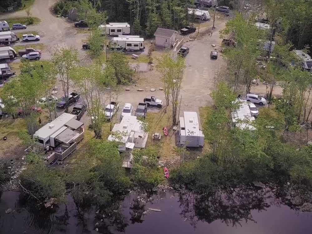 An aerial view of the RV sites by the water at CASTLE LAKE CAMPGROUND & COTTAGES