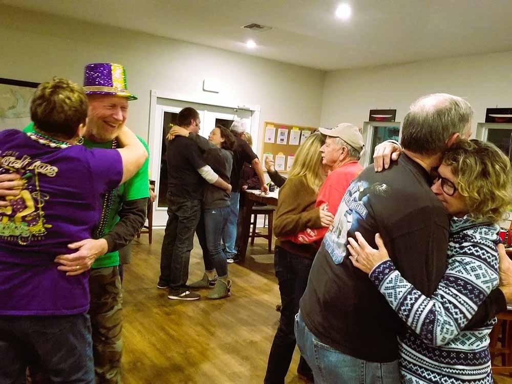 People dancing in the lounge at AHOY RV RESORT