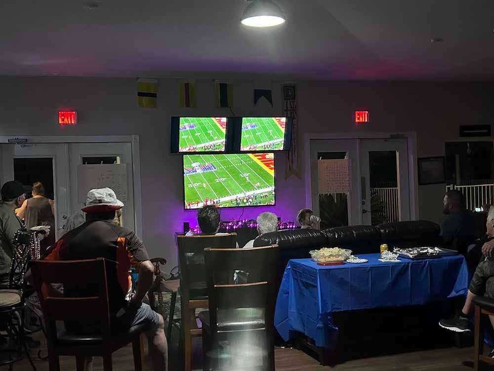 A football party in the lounge at AHOY RV RESORT