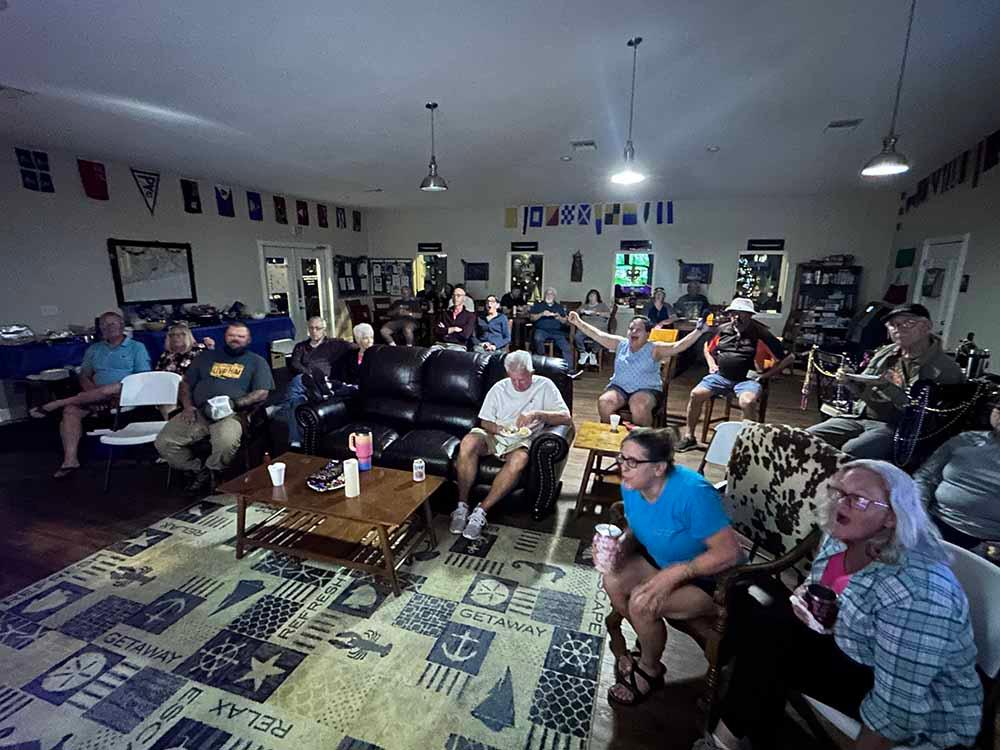 A large group watching the big game at AHOY RV RESORT