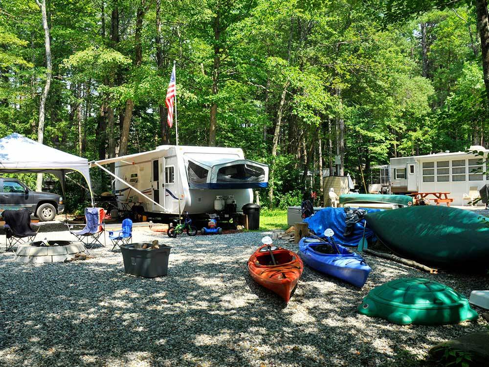 Trailers and tents camping at TUXBURY POND RV CAMPGROUND