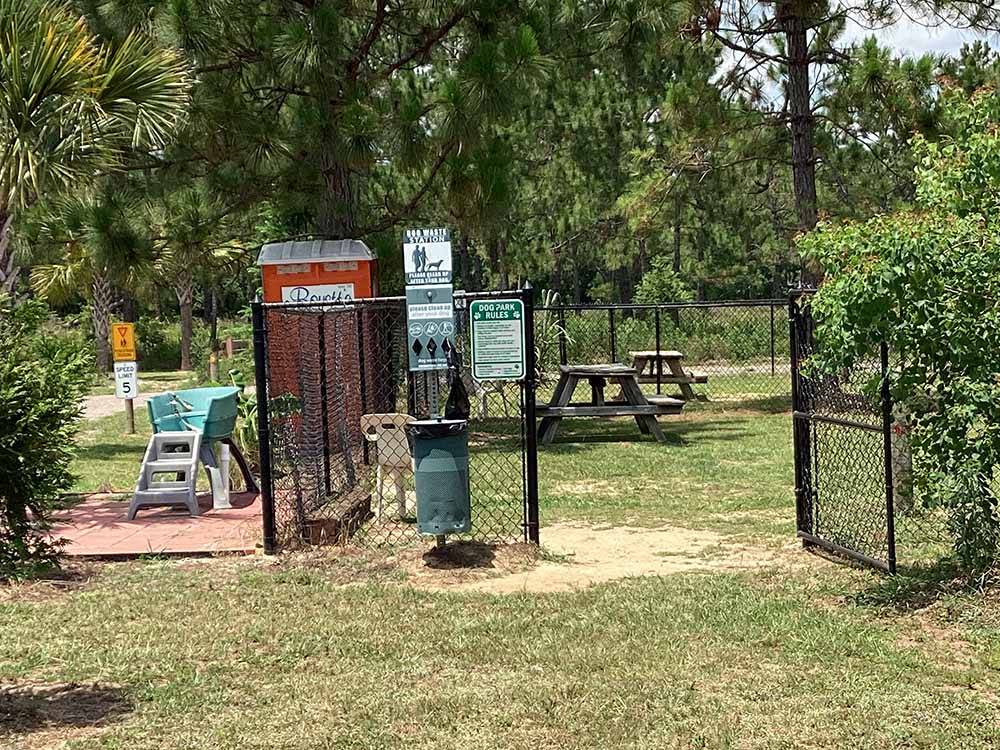 The fenced in pet area at ALABAMA COAST CAMPGROUND