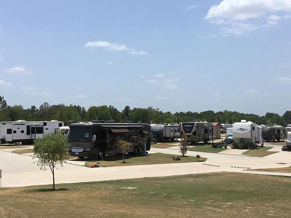 View of motorhomes and trailers parked at EAST FORK RV RESORT