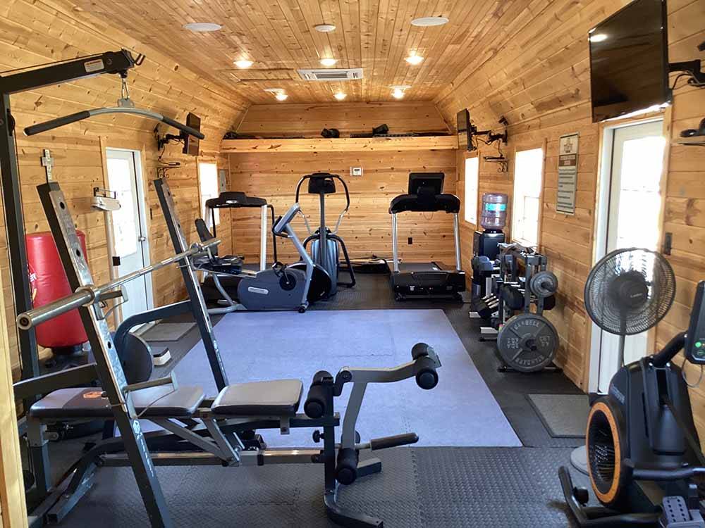 Exercise room with gym equipment at DO DROP INN RV RESORT & CABINS