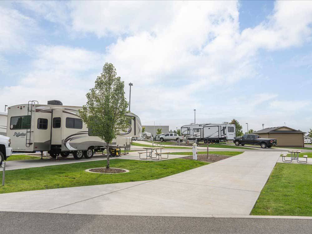 RVs parked at campsites at LIBERTY LAKE RV CAMPGROUND