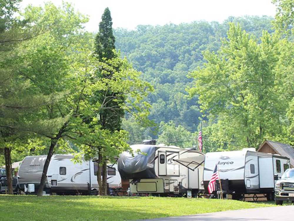 Motorhomes parked in campsites at GATEWAY TO THE SMOKIES RV PARK & CAMPGROUND
