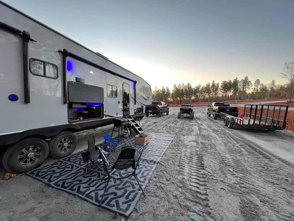 A fifth wheel trailer in a site at IRON MOUNTAIN RESORT