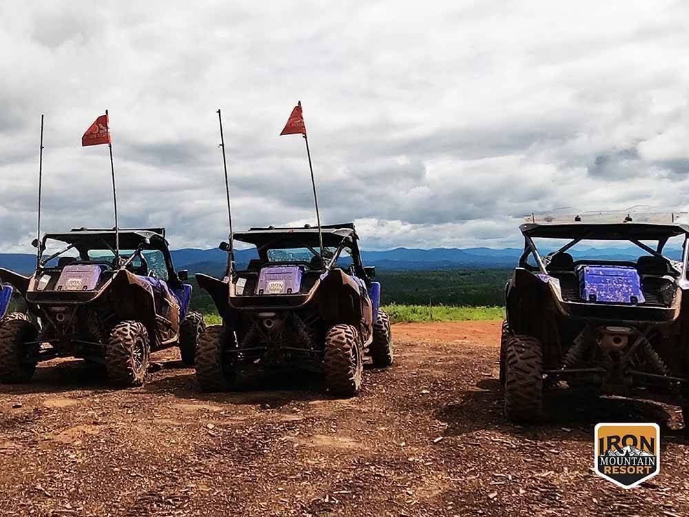 A line of ATVs on the trail at IRON MOUNTAIN RESORT