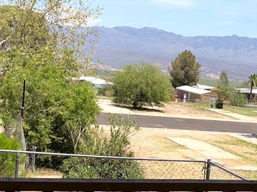 A group of dirt RV sites at RANCHO SAN MANUEL MOBILE HOME & RV PARK