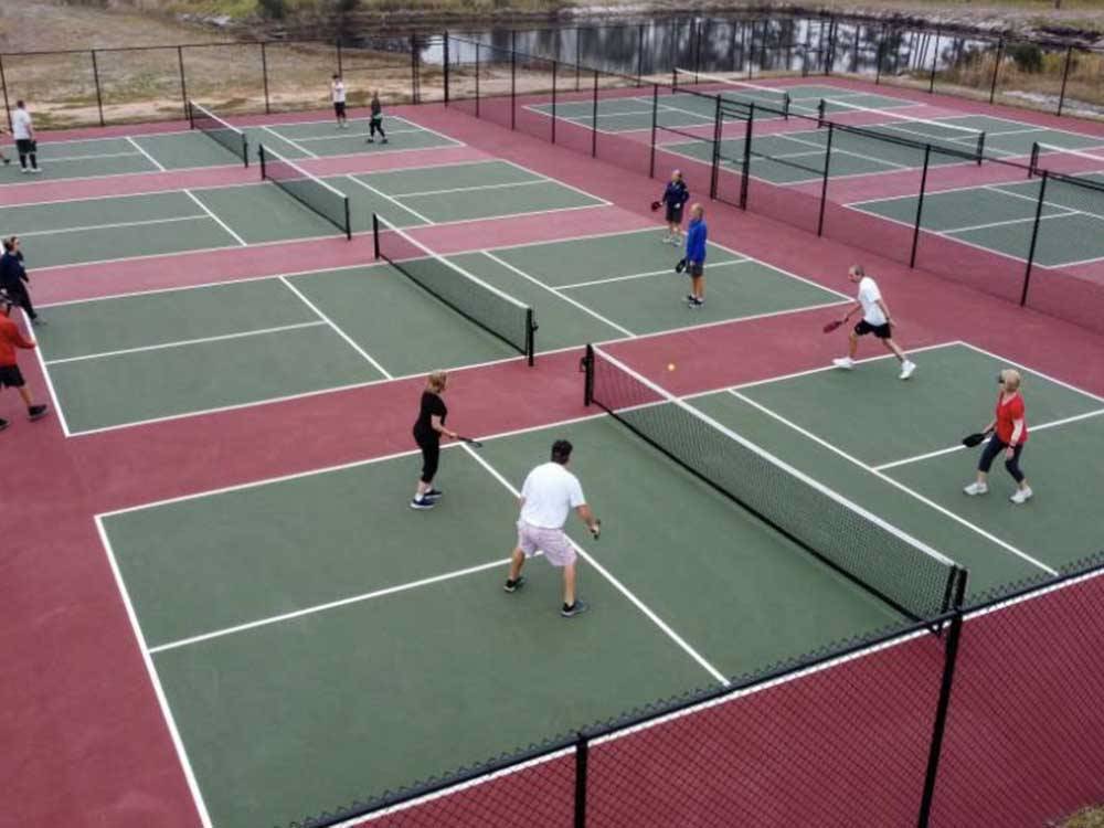 Players compete on pickleball courts at RESORT AT CANOPY OAKS