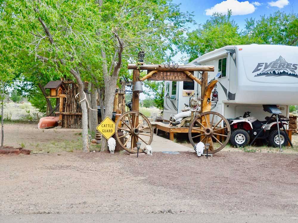 Fifth-wheel with wooden entrance at ST JOHNS RV RESORT