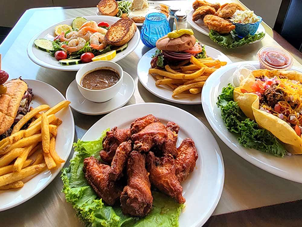 Plates laden with burgers, fries and more at BIG ARM RESORT & CASINO