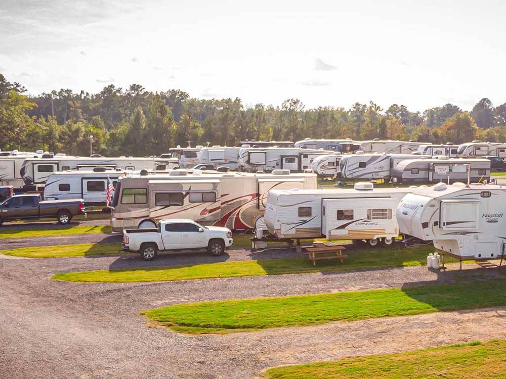 A row of pull thru RV sites at HAWKINS POINTE PARK, STORE & MORE