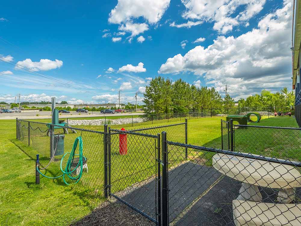The fenced in pet area at HAWKINS POINTE PARK, STORE & MORE