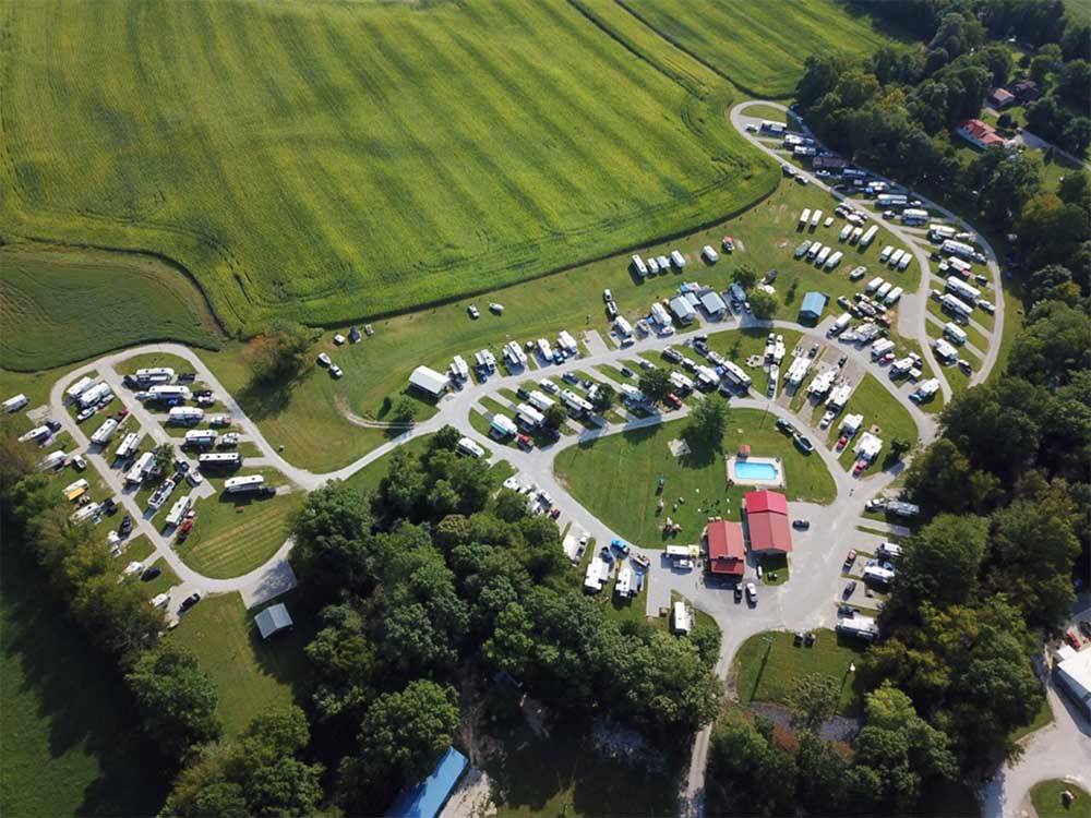 An aerial view of the pool and campsites at OUTPOST RV PARK & CAMPGROUND