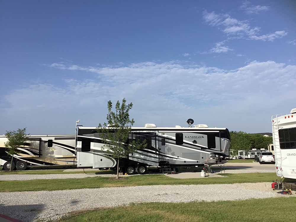 A row of gravel RV sites at THE RETREAT AT SHADY CREEK