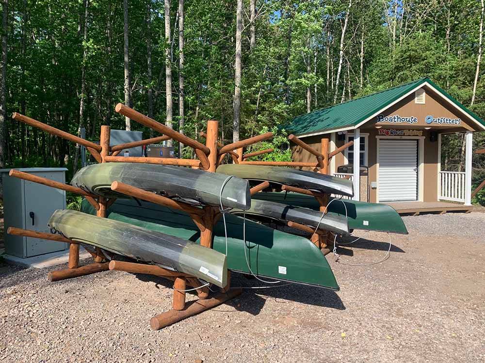 Canoes on a rack by the cabin at MONT DU LAC RESORT