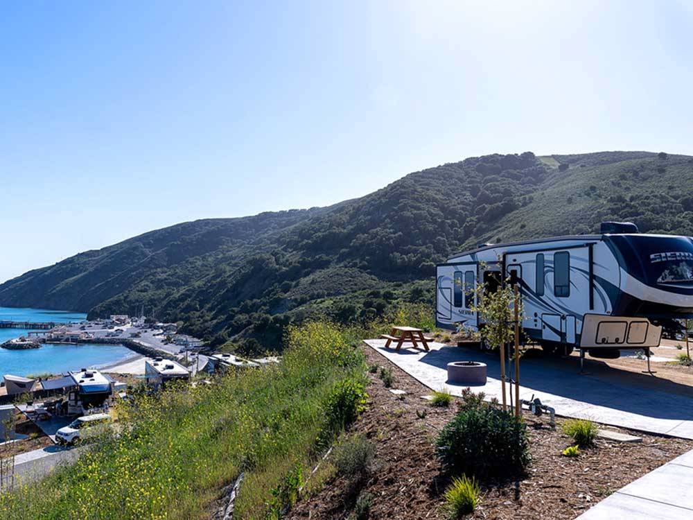 Fifth wheel at campsite overlooking beach at FLYING FLAGS AVILA BEACH