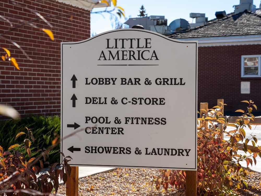 A directional sign posted at LITTLE AMERICA RV PARK