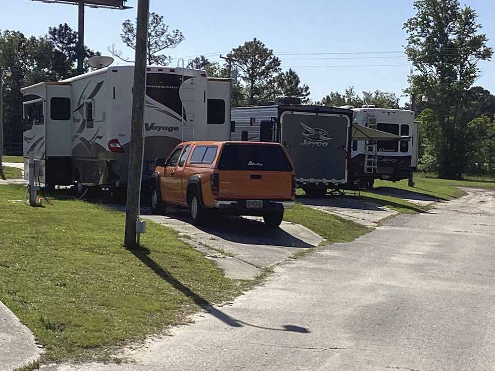The rear ends of motorhomes at CAMPGROUNDS OF THE SOUTH