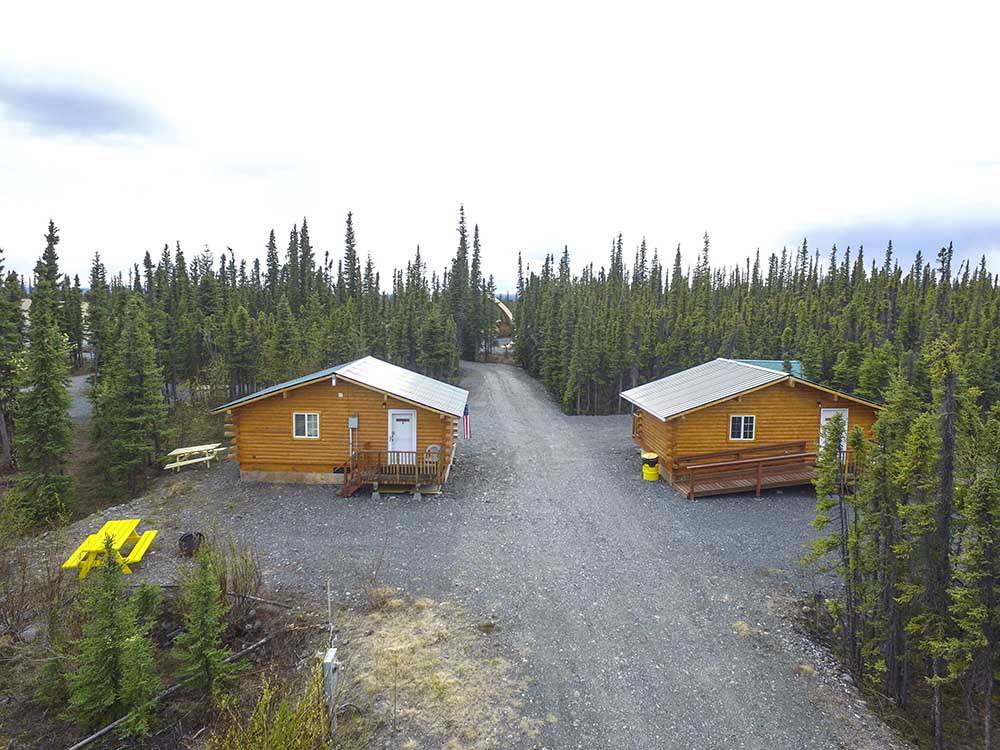 An aerial view of two of the cabins at NORTHERN NIGHTS CAMPGROUND
