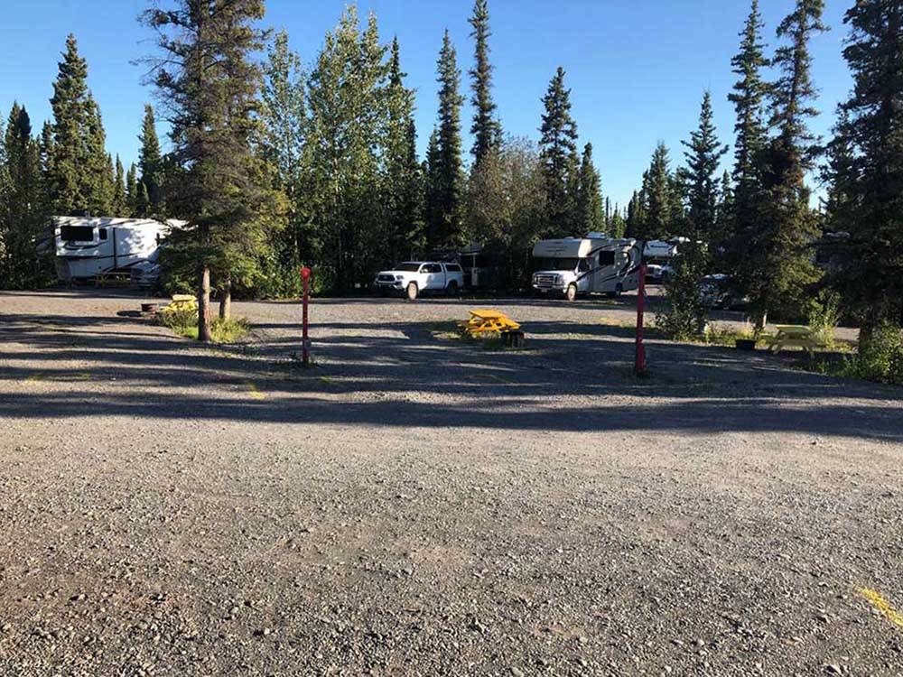 A group of gravel RV sites at NORTHERN NIGHTS CAMPGROUND