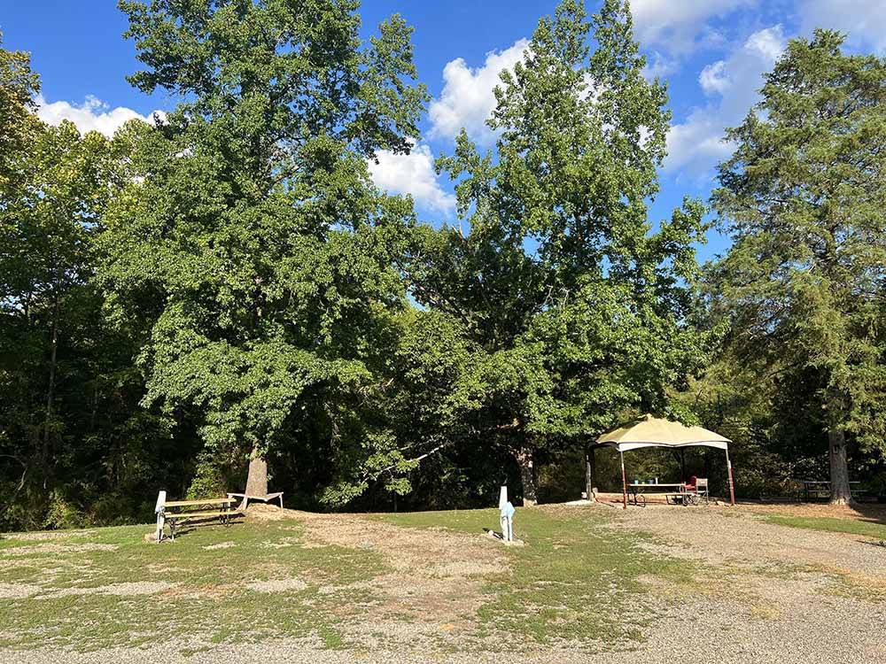 A group of rustic RV sites at J & J RV PARK