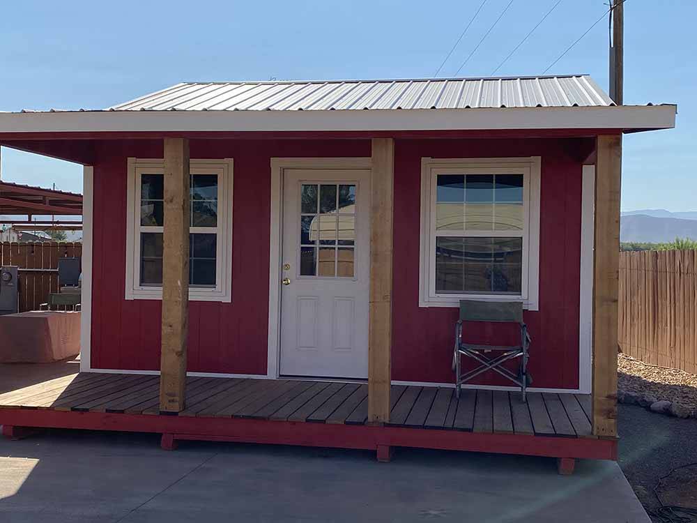 One of the red buildings at BOOT HILL RV RESORT