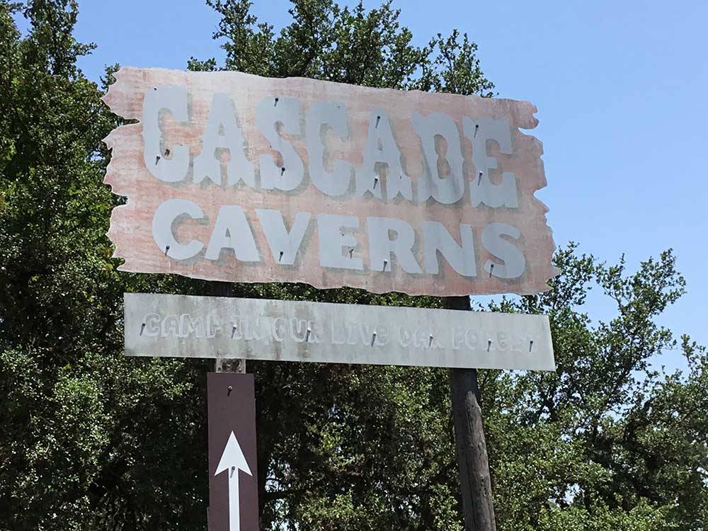 The main entrance sign at CASCADE CAVERNS & CAMPGROUND