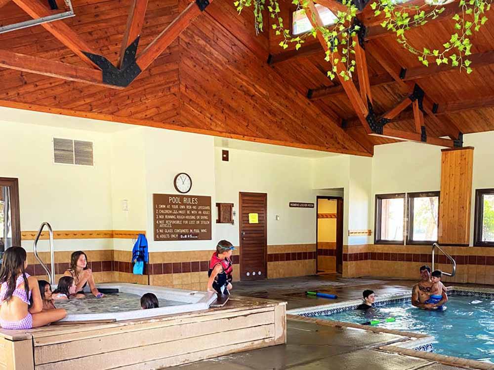Indoor swimming pool and hot tub at THOUSAND TRAILS BLUE MESA RECREATIONAL RANCH