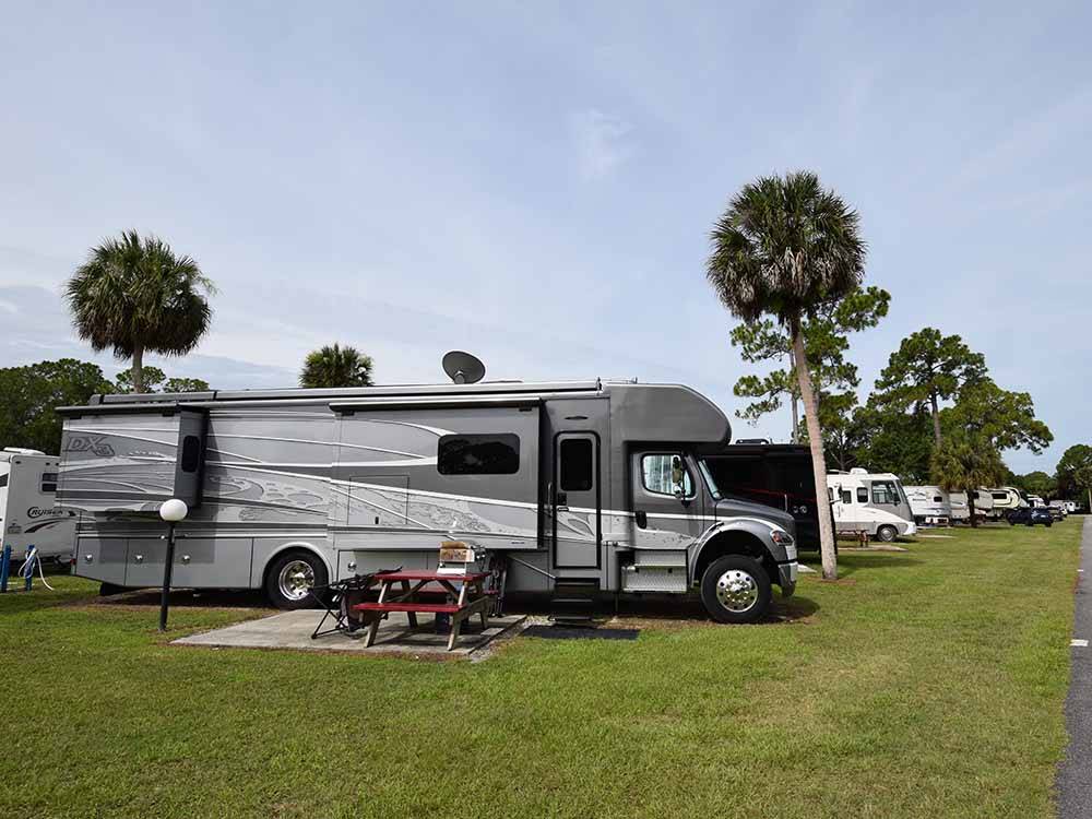 A large Class C motorhome parked at JOY RV RESORT
