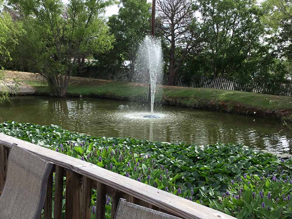 The fountain in the pond at FREDERICKSBURG RV PARK