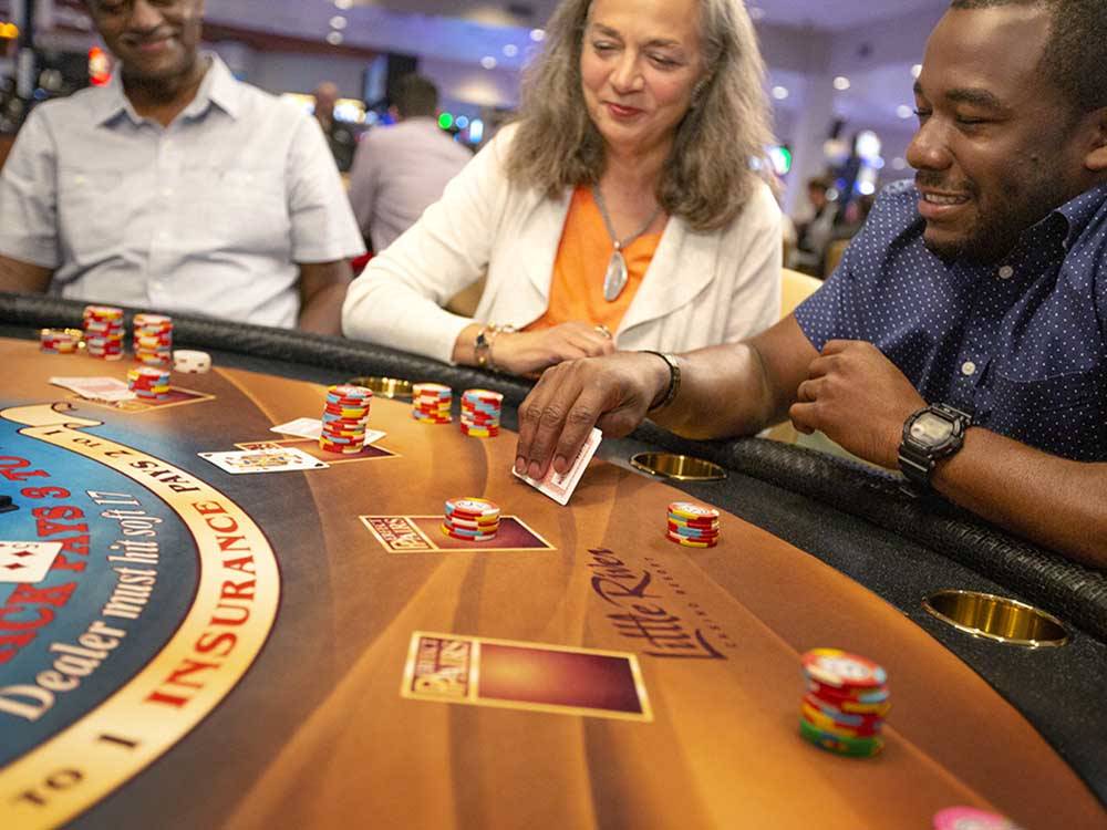 People playing blackjack at LITTLE RIVER CASINO RESORT RV PARK