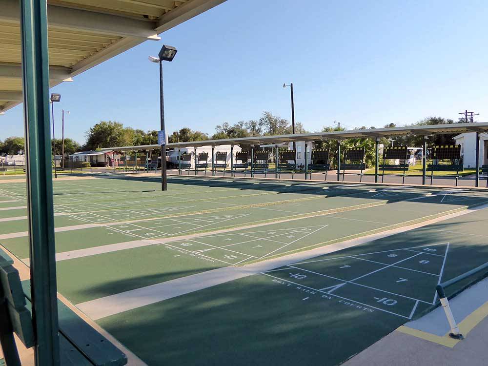 A row of shuffleboard courts at SNOW TO SUN RV RESORT