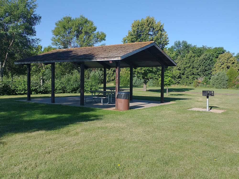 Canopy covering tables in a picnic area at WYLIE PARK CAMPGROUND & STORYBOOK LAND