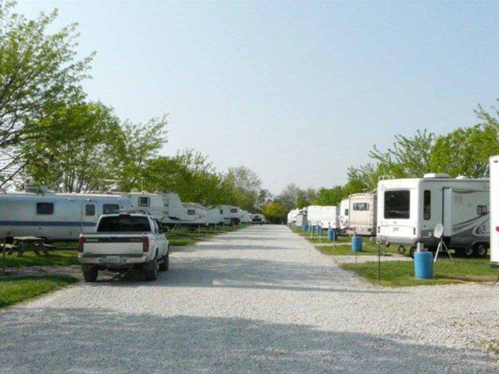 Road with campers in campsites at NEW VISION RV PARK