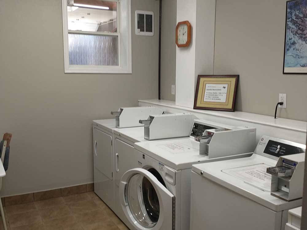 Laundry room with two washers and dryers at NORTH PARK RV CAMPGROUND