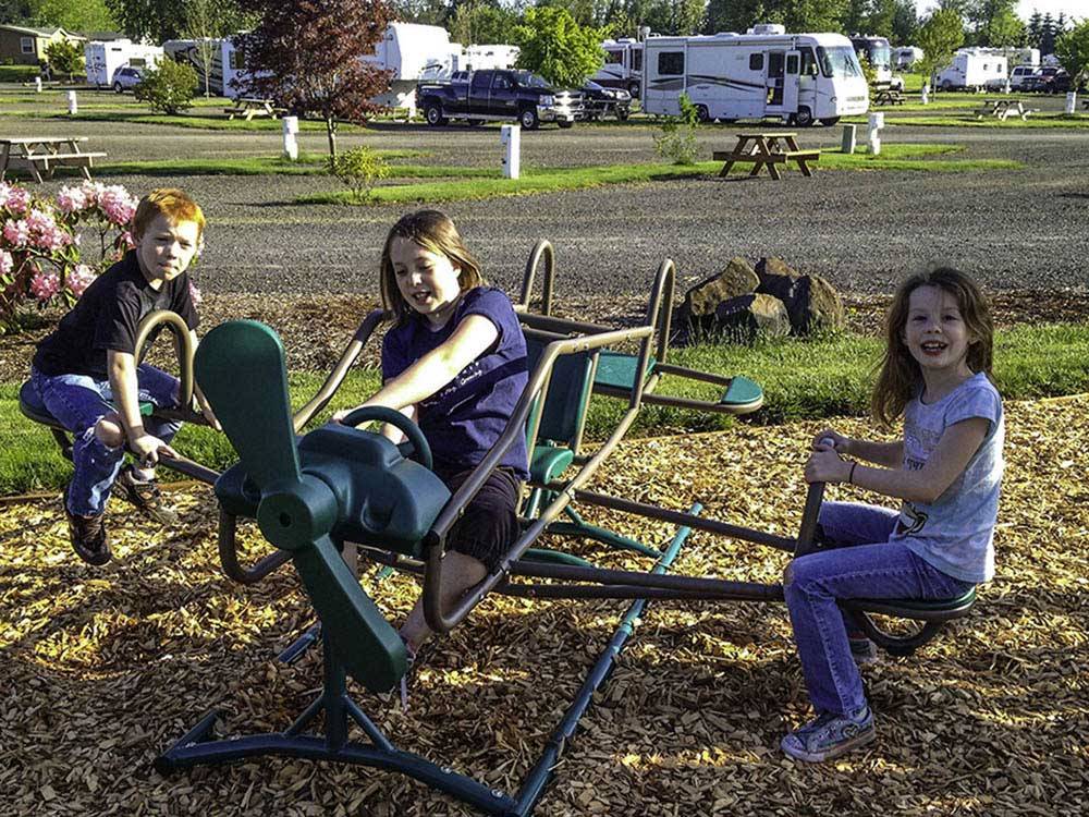 Kids playing at SILVER SPUR RV PARK & RESORT