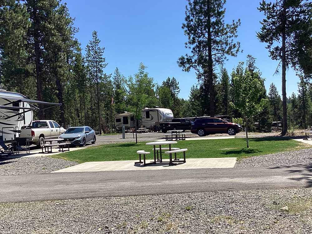 A picnic table next to an RV site at MCCALL RV RESORT
