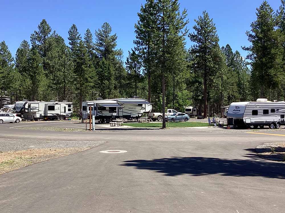 A road leading to a group of RV sites at MCCALL RV RESORT