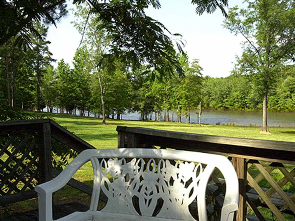 The deck overlooking the river at BIRDSONG RESORT & MARINA LAKESIDE RV & TENT CAMPGROUND