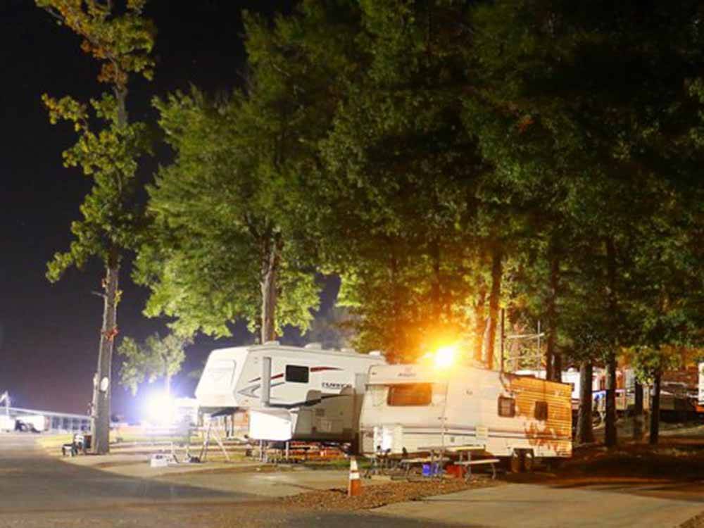 Paved back in RV sites at night at BIRDSONG RESORT & MARINA LAKESIDE RV & TENT CAMPGROUND