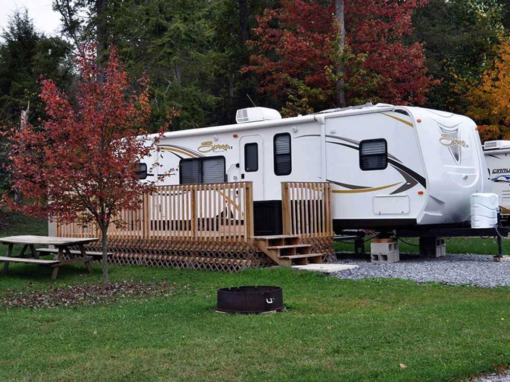 Site with built on deck at TWIN GROVE RV RESORT & COTTAGES