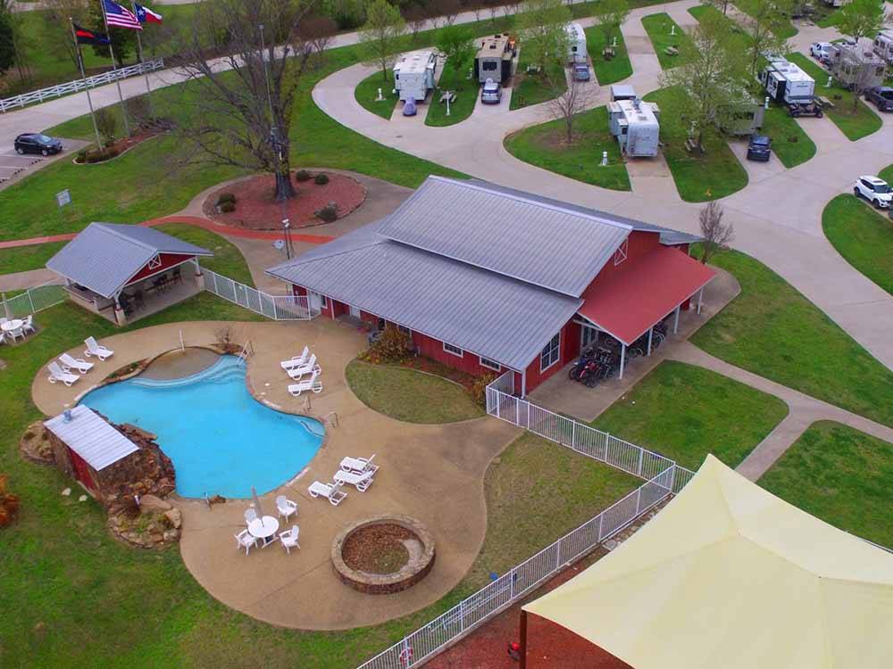 An aerial view of the swimming pool and a building at MILL CREEK RANCH RESORT