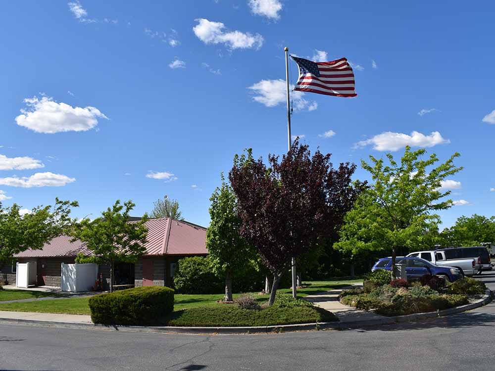 The flag pole in front of the registration building at HORN RAPIDS RV RESORT