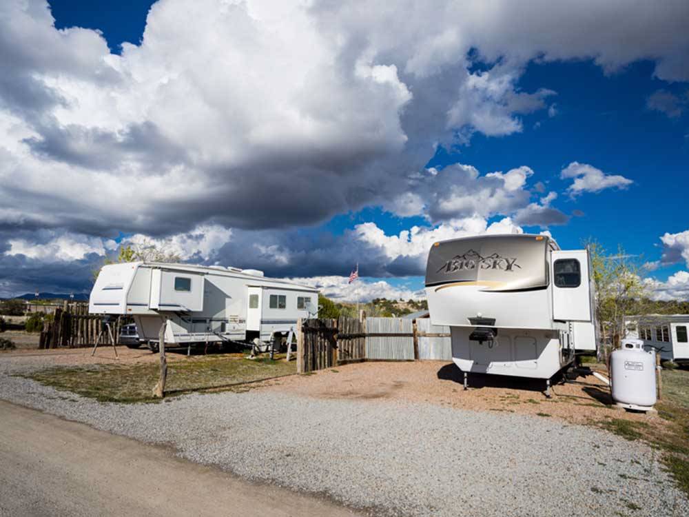 A couple of fifth wheel trailers at ROSE VALLEY RV RANCH & CASITAS