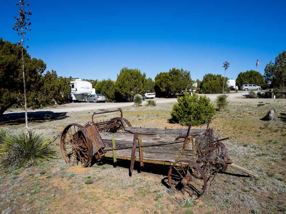 An old wooden wagon lawn ornament at ROSE VALLEY RV RANCH & CASITAS